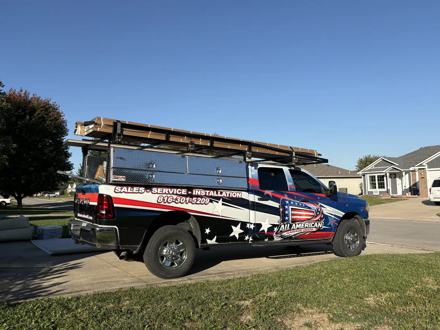 All American Garage Door wrapped service truck, view 2