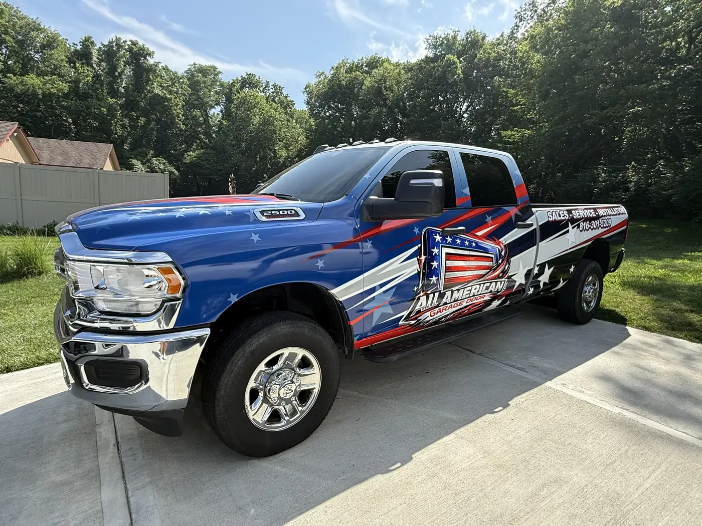 All American Garage Door wrapped service truck, view 3